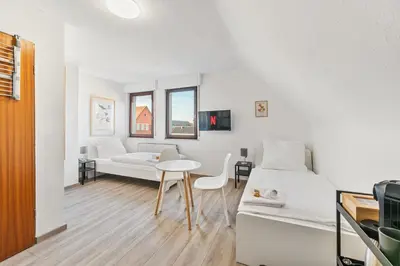 Ein Bett oder Betten in einem Zimmer der Unterkunft Monteur Apartments Heilbronn City - LOW BUDGET, PARKING, WIFI, SMART TV NEW