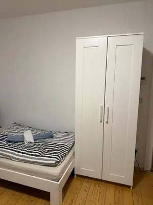 Ein Bett oder Betten in einem Zimmer der Unterkunft Monteur- und Ferienwohnung Landau - Südliche Weinstraße