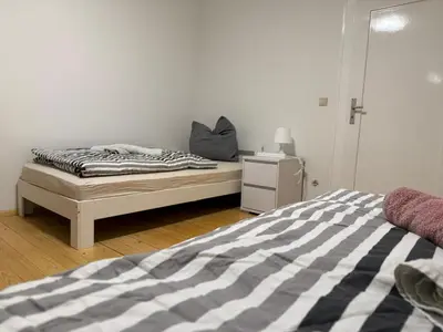 Ein Bett oder Betten in einem Zimmer der Unterkunft Monteur- und Ferienwohnung Landau - Südliche Weinstraße