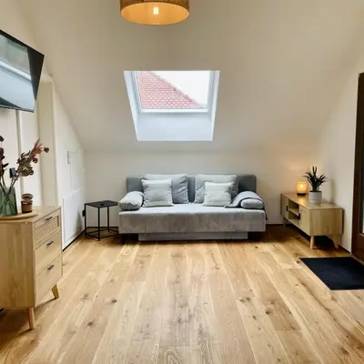 Ein Sitzbereich in der Unterkunft Ferienwohnung Weingut Braun & Söhne
