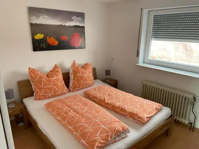 Ein Bett oder Betten in einem Zimmer der Unterkunft Haus Gaui