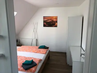 Ein Bett oder Betten in einem Zimmer der Unterkunft Haus Gaui