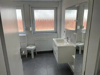 Ein Badezimmer in der Unterkunft Haus Gaui