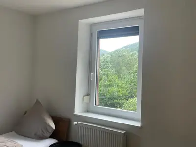 Ein Bett oder Betten in einem Zimmer der Unterkunft Haus Grünwald