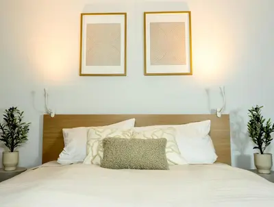 Ein Bett oder Betten in einem Zimmer der Unterkunft Auszeit am Marktplatz - Design Ferienwohnungen mit Wohlfühlfaktor
