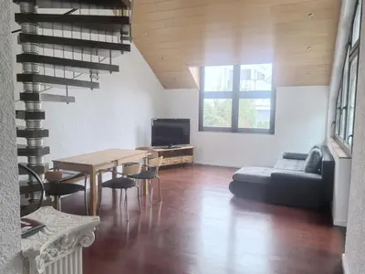Ein Sitzbereich in der Unterkunft Schöne Maisonette im Villa 12-5 Uni Mainz