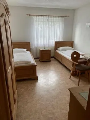 Ein Bett oder Betten in einem Zimmer der Unterkunft Gaststätte Wiesengrund