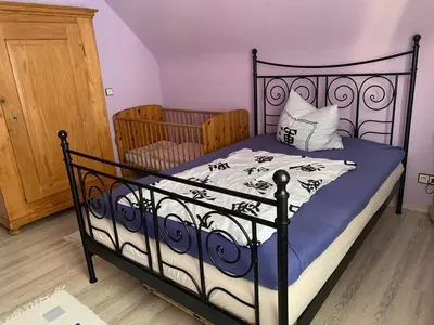 Ein Bett oder Betten in einem Zimmer der Unterkunft Ferienwohnung Erftal