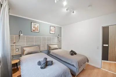 Ein Bett oder Betten in einem Zimmer der Unterkunft Amalfi A08 - super zentral für 4PP - 2 Zimmer & Boxspringbetten
