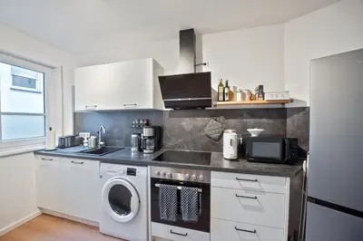 Küche/Küchenzeile in der Unterkunft Amalfi A08 - super zentral für 4PP - 2 Zimmer & Boxspringbetten