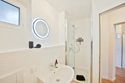 Ein Badezimmer in der Unterkunft Amalfi A08 - super zentral für 4PP - 2 Zimmer & Boxspringbetten