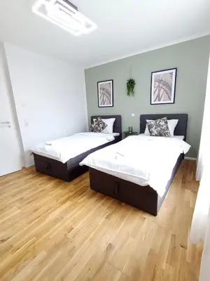 Ein Bett oder Betten in einem Zimmer der Unterkunft WAT Wohnung KL