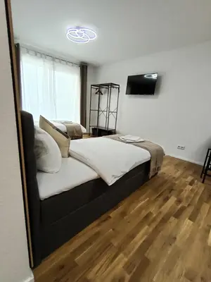 Ein Bett oder Betten in einem Zimmer der Unterkunft WAT Wohnung KL