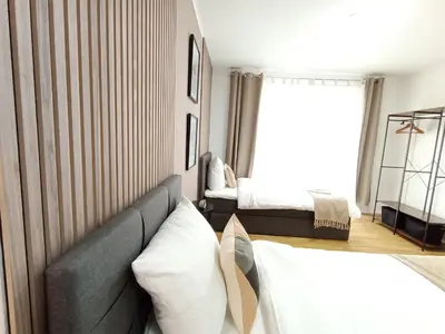 Ein Bett oder Betten in einem Zimmer der Unterkunft WAT Wohnung KL