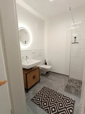Ein Badezimmer in der Unterkunft WAT Wohnung KL