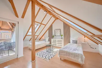 Ein Bett oder Betten in einem Zimmer der Unterkunft BackHome - MAISIONETTE - Parkplatz - Fantastische Schlosslage - SmartTV - Waschmaschine - Netflix - 70qm - 24h Checkin- Apartment 5