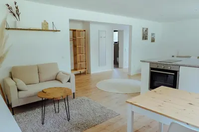 Ein Sitzbereich in der Unterkunft Le Souterrain Ferienwohnung Gimmeldingen