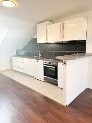 Küche/Küchenzeile in der Unterkunft Moderne DG Wohnung in Linkenheim