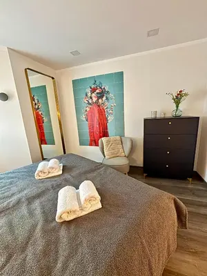 Ein Bett oder Betten in einem Zimmer der Unterkunft Stilvolle Einliegerwohnung mit Boxspringbett