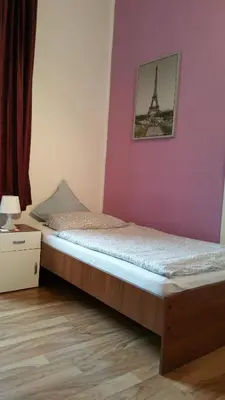 Ein Bett oder Betten in einem Zimmer der Unterkunft Pension Anna