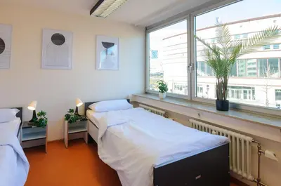 Ein Bett oder Betten in einem Zimmer der Unterkunft MZK Maier Inexpensive and central