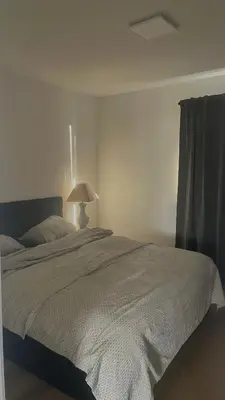 Ein Bett oder Betten in einem Zimmer der Unterkunft Moderne Ferienwohnung Bad Rappenau Verdistraße 9