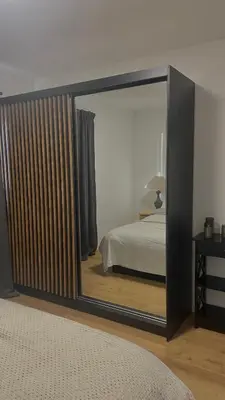 Ein Bett oder Betten in einem Zimmer der Unterkunft Moderne Ferienwohnung Bad Rappenau Verdistraße 9