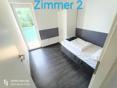 Ein Bett oder Betten in einem Zimmer der Unterkunft WH37a
