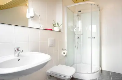 Ein Badezimmer in der Unterkunft Hotel Bernstein