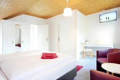 Ein Bett oder Betten in einem Zimmer der Unterkunft Hotel Bernstein