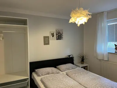 Ein Bett oder Betten in einem Zimmer der Unterkunft Ferienwohnung Daly