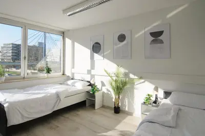 Ein Bett oder Betten in einem Zimmer der Unterkunft MZK Maier Schnäppchen im Zentrum