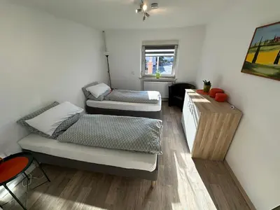 Ein Bett oder Betten in einem Zimmer der Unterkunft Ferienwohnung Am Kirschbaum Mömlingen