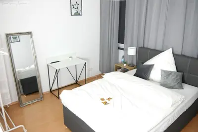Ein Bett oder Betten in einem Zimmer der Unterkunft Pforzheim Schöne Wohnung