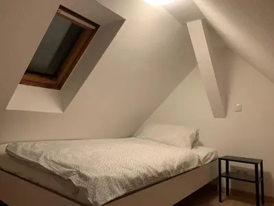 Ein Bett oder Betten in einem Zimmer der Unterkunft Monteurapartment in Kaiserslautern
