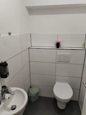 Ein Badezimmer in der Unterkunft Marie Zimmer Zentral Bequem