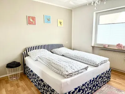 Ein Bett oder Betten in einem Zimmer der Unterkunft Gemütliche 2 Zimmer Wohnung in Kleinostheim