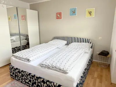 Ein Bett oder Betten in einem Zimmer der Unterkunft Gemütliche 2 Zimmer Wohnung in Kleinostheim