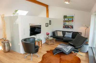 Ein Sitzbereich in der Unterkunft Ferienhaus am Bellachini