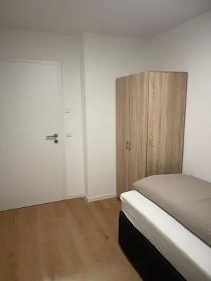 Ein Bett oder Betten in einem Zimmer der Unterkunft Sehr schöne und Modernisierte Wohnung mit moderne Wohnraumlüftung