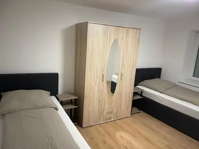 Ein Bett oder Betten in einem Zimmer der Unterkunft Sehr schöne und Modernisierte Wohnung mit moderne Wohnraumlüftung