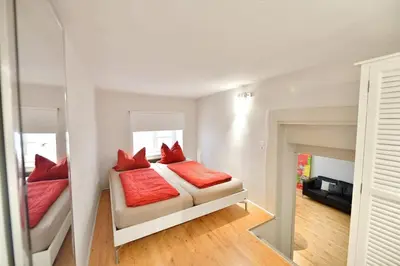 Ein Bett oder Betten in einem Zimmer der Unterkunft Altstadtapartment Hochparterre
