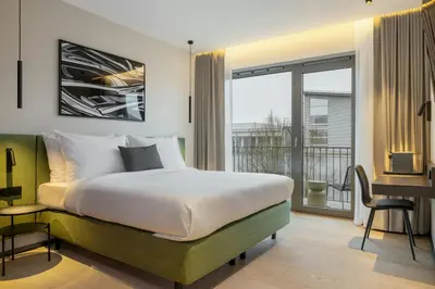 Ein Bett oder Betten in einem Zimmer der Unterkunft DAS AFFALTERBACH, Stuttgart, Autograph Collection