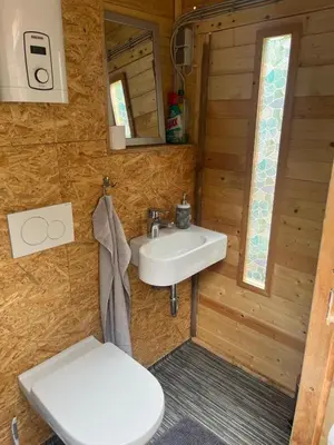 Ein Badezimmer in der Unterkunft Forsthäuschen am Ponyhof