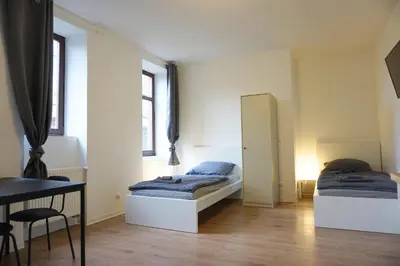 Ein Bett oder Betten in einem Zimmer der Unterkunft 11 Monteursapartments zur Alleinnutzung