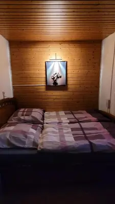 Ein Bett oder Betten in einem Zimmer der Unterkunft Apartment Wiesenglück