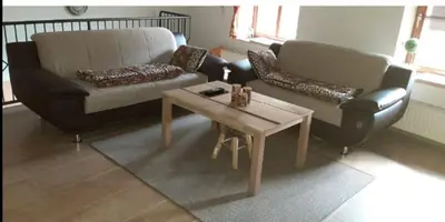 Ein Sitzbereich in der Unterkunft Ferienwohnung Zur Flomborner Wutz