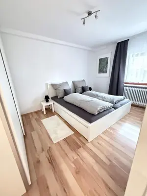 Ein Bett oder Betten in einem Zimmer der Unterkunft Ferienwohnung in den Bergdörfern