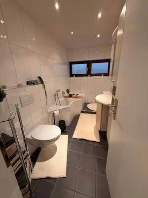 Ein Badezimmer in der Unterkunft Ferienwohnung in den Bergdörfern