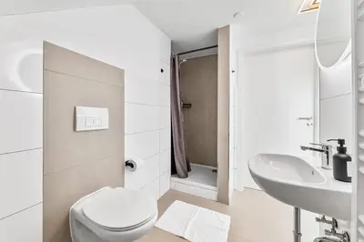 Ein Badezimmer in der Unterkunft Zentral - 4 Schlafzimmer - Küche - Waschmaschine